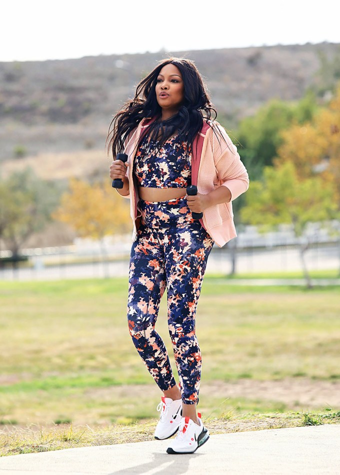 Garcelle Beauvais works out at the park