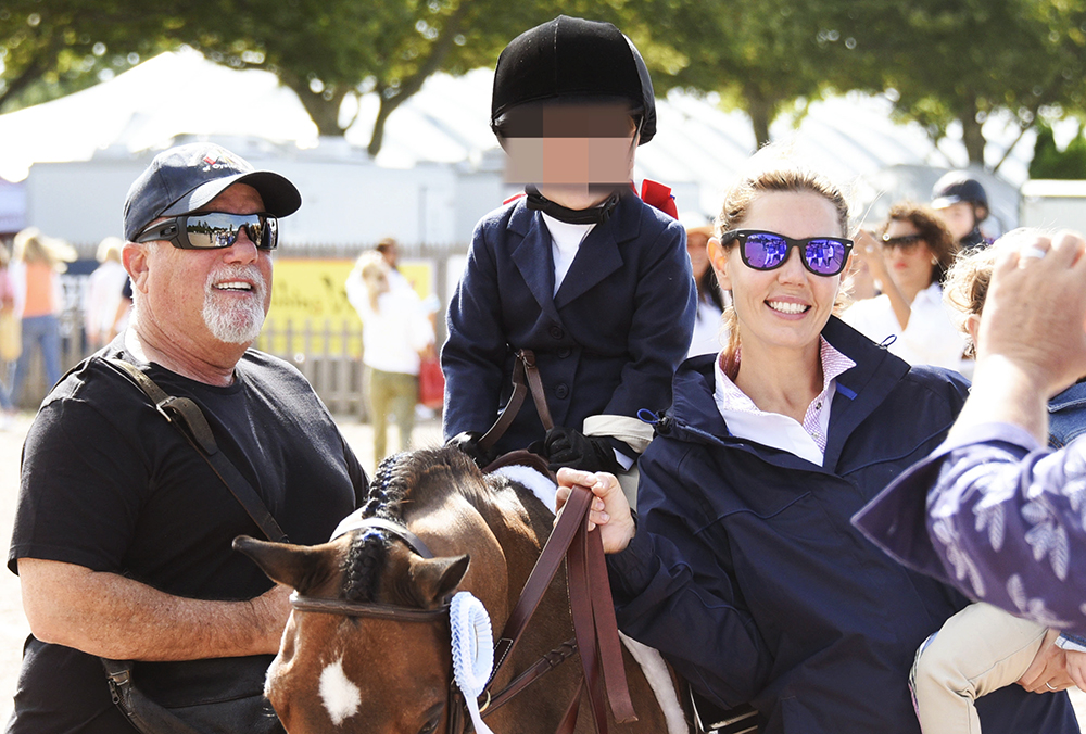 EXCLUSIVE Billy Joel, daughter Della Joel, and wife Alexis Roderick celebrate Della's participation in the 2019 Hampton Classic Horseshow