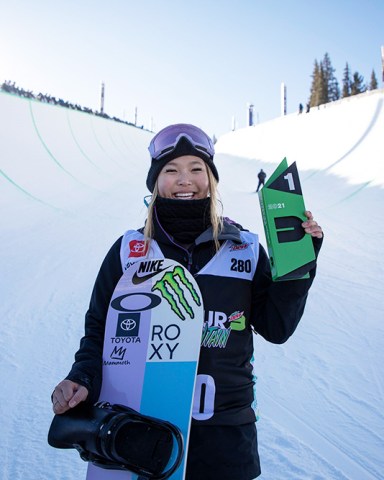 Chloe Kim, of the United States, holds the first place finish following the snowboarding halfpipe finals, during Dew Tour at Copper Mountain, Colo Halfpipe Qualifying Snowboarding Olympics, Copper Mountain, United States - 19 Dec 2021