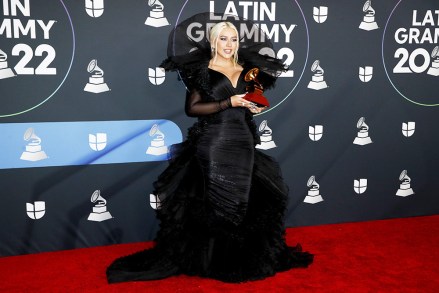 Christina Aguilera holds the award for Best Traditional Vocal Album in the press room during the 23rd Annual Latin Grammy Awards at the Michelob Ultra Arena in Mandalay Bay in Las Vegas, Nevada, U.S., November 17, 2022. Latin Grammys recognize art and/or technical achievement, not sales figures or chart position, and winners are determined by the votes of their peers - members who vote eligibility of the academy.  Press Room - 23rd Latin Grammy Awards, Las Vegas, USA - November 17, 2022