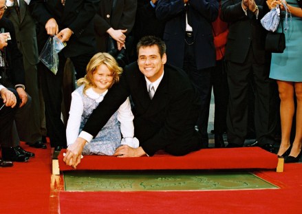 Daughter Jane Carrey and Jim Carrey
Jim Carrey Hand and Footprint Ceremony
November 11, 1995 - Hollywood, CA
Daughter Jane Carrey and Jim Carrey  .
Jim Carrey is honored with a Star on the Hollywood Walk of Fame in front of Grauman's Chinese Theatre.
Photos®Berliner Studio/BEImages