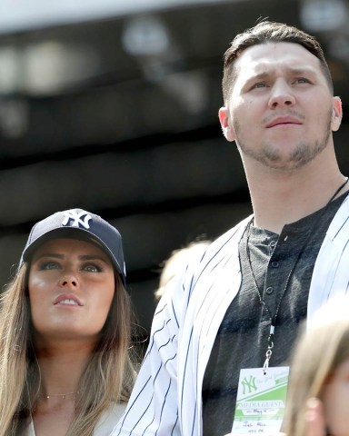 Buffalo Bills NFL football quarterback Josh Allen, right, and his girlfriend Brittany Williams look on during the seventh inning stretch of a baseball game between the New York Yankees and the Minnesota Twins, in New York
Twins Yankees Baseball, New York, USA - 04 May 2019