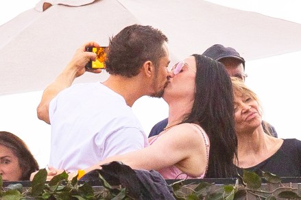 EXCLUSIVE: Katy Perry and Orlando Bloom were swept up in the emotion that rapidly filled Hyde Park as Bruce Springsteen took to the stage for his latest BST performance at the “American Express presents BST Hyde Park" festival. The Lord Of The Rings actor could be seen nuzzling his pop-star girlfriend's ear as they danced alongside the likes of Emma Thompson, Leslie Mann and Oscar-winner Tim Robbins. Evidently in the mood to document their latest public display of affection, Orlando, 46, raised his iPhone to snap of photo of himself and Katy, 38, let their hair down. , The Lord Of The Rings actor could be seen nuzzling his pop star girlfriend's ear as they danced alongside the likes of Emma Thompson, Leslie Mann and Oscar-winner Tim Robbins. California Gurls hitmaker Katy put on a very leggy display for her loved-up outing in a pale pink Prada mini-dress which hugged every inch of her fabulous figure. 08 Jul 2023 Pictured: Orlando Bloom, Katy Perry. Photo credit: MEGA TheMegaAgency.com +1 888 505 6342 (Mega Agency TagID: MEGA1005498_030.jpg) [Photo via Mega Agency]