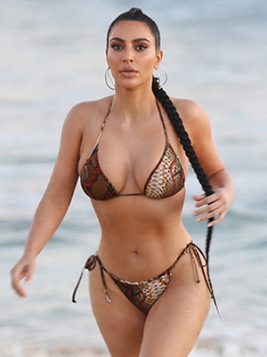 Kim Kardashian Relaxes In Hot Pink Bikini Vacation Photos – Hollywood Life