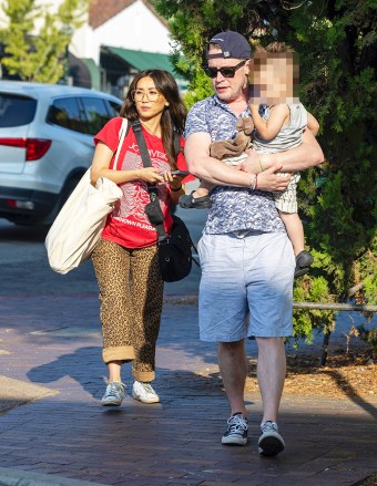 Pasadena, CA - *EXCLUSIVE* - Macaulay Culkin, Brenda Song and their adorable son were spotted at a cute and cool Pasadena Farmers Market.  The Home Alone actor and his wife took their one-year-old son for a family day out with the little one sporting a mohawk.  Brenda left the farmer's market with a bouquet of colorful roses.  Pictured: MaCaulay Culkin, Brenda Song BACKGRID USA 6 OCTOBER 2022 USA: +1 310 798 9111 / usasales@backgrid.com UK: +44 208 344 2007 / uksales@backgrid.com *UK Customers - Images containing children Please pixelate face before Publication*