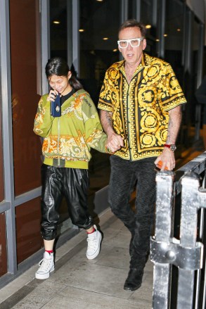 West Hollywood, CA  - *EXCLUSIVE- Hollywood A-lister Nicolas Cage, his pregnant wife Riko Shibata, and his son Weston, were seen exiting Toku Unagi & Sushi in West Hollywood after enjoying dinner together.

Pictured: Nicolas Cage, Riko Shibata

BACKGRID USA 19 APRIL 2022 

USA: +1 310 798 9111 / usasales@backgrid.com

UK: +44 208 344 2007 / uksales@backgrid.com

*UK Clients - Pictures Containing Children
Please Pixelate Face Prior To Publication*