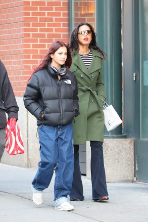 New York, NY  - *EXCLUSIVE*  - Author Padma Lakshmi spotted with her daughter Krishna on a walk in New York CityPictured: Padma LakshmiBACKGRID USA 18 MARCH 2023 BYLINE MUST READ: T.JACKSON / BACKGRIDUSA: +1 310 798 9111 / usasales@backgrid.comUK: +44 208 344 2007 / uksales@backgrid.com*UK Clients - Pictures Containing ChildrenPlease Pixelate Face Prior To Publication*