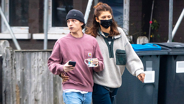 Zendaya Sweetly Wraps Her Arm Around Tom Holland’s Waist As They Visit His Family In The UK: Photo.jpg