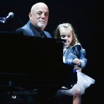 Musician Billy Joel sits with his daughter Della Rose Joel during his 100th lifetime performance at Madison Square Garden, in New York
Billy Joel 100th Lifetime Performance, New York, USA - 18 Jul 2018
