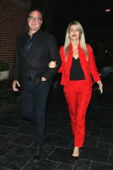Los Angeles, CA  - *EXCLUSIVE*  - Comedian Bob Saget and his girlfriend Kelly Rizzo were spotted heading to a dinner date at Avenue during a night out in Los Angeles. Kelly brightened up the couple's look with a bright red pantsuit.Pictured: Bob Saget, Kelly RizzoBACKGRID USA 5 APRIL 2018BYLINE MUST READ: Yolo / BACKGRIDUSA: +1 310 798 9111 / usasales@backgrid.comUK: +44 208 344 2007 / uksales@backgrid.com*UK Clients - Pictures Containing Children
Please Pixelate Face Prior To Publication*