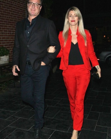 Los Angeles, CA  - *EXCLUSIVE*  - Comedian Bob Saget and his girlfriend Kelly Rizzo were spotted heading to a dinner date at Avenue during a night out in Los Angeles. Kelly brightened up the couple's look with a bright red pantsuit.Pictured: Bob Saget, Kelly RizzoBACKGRID USA 5 APRIL 2018 BYLINE MUST READ: Yolo / BACKGRIDUSA: +1 310 798 9111 / usasales@backgrid.comUK: +44 208 344 2007 / uksales@backgrid.com*UK Clients - Pictures Containing ChildrenPlease Pixelate Face Prior To Publication*