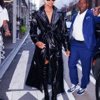 Ciara Wears A Black Vinyl Coat And Thigh-High Boots During New York Fashion Week 2022