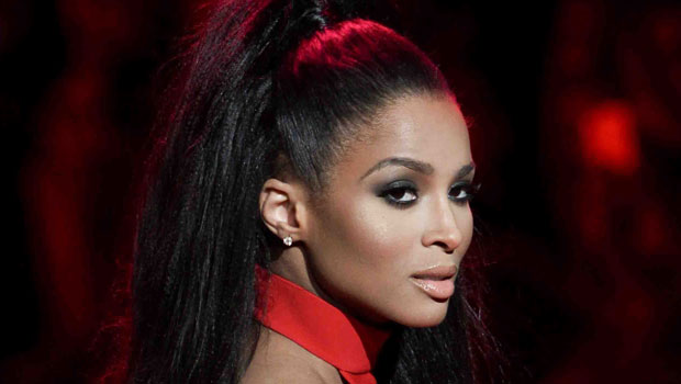 Ciara Sunbathes In A Sexy Red Swimsuit With Cut Outs On Tropical Vacation – Photo