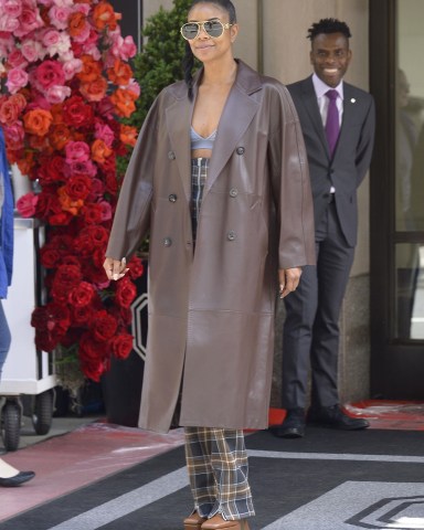New York, NY  - Gabrielle Union wears a leather trench coat and plaid pants as she exits the Mark Hotel in New York City.Pictured: Gabrielle UnionBACKGRID USA 1 MAY 2022 BYLINE MUST READ: BACKGRIDUSA: +1 310 798 9111 / usasales@backgrid.comUK: +44 208 344 2007 / uksales@backgrid.com*UK Clients - Pictures Containing ChildrenPlease Pixelate Face Prior To Publication*