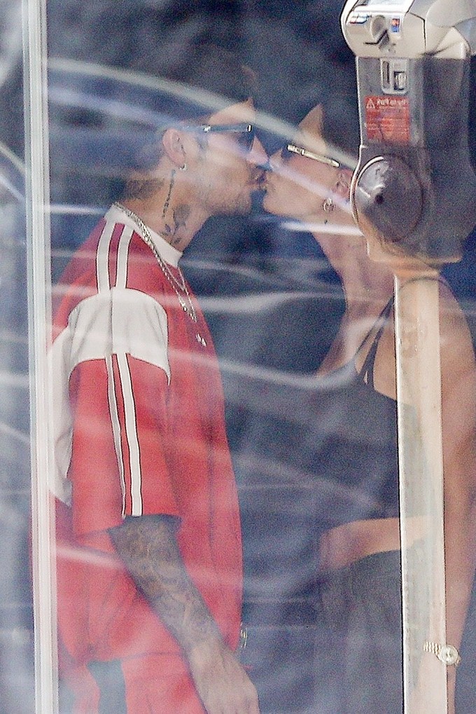 Hailey shares a sweet kiss with Justin