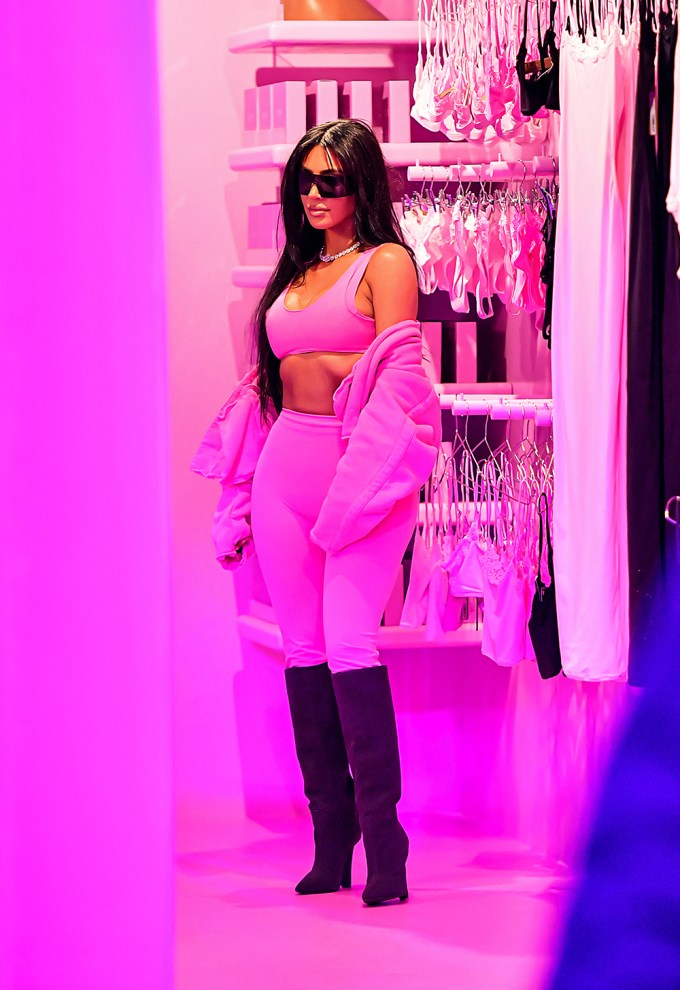 Kim Kardashian Wears Neon Camo Top and Leggings to Shop in Paris