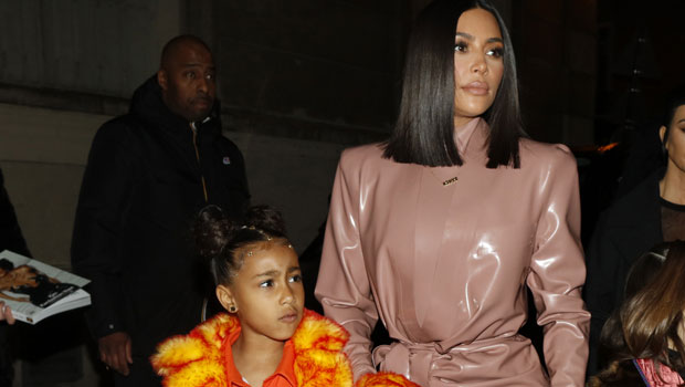 Kim Kardashian, Kanye West, and daughter North at Virgil Abloh