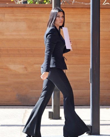 Los Angeles, CA  - *EXCLUSIVE*  - Just Married! Kourtney Kardashian displays her curves in all-black as we spot the KUWTK star for the first time since she wed Travis Barker in Las Vegas.Pictured: Kourtney KardashianBACKGRID USA 6 APRIL 2022 USA: +1 310 798 9111 / usasales@backgrid.comUK: +44 208 344 2007 / uksales@backgrid.com*UK Clients - Pictures Containing ChildrenPlease Pixelate Face Prior To Publication*