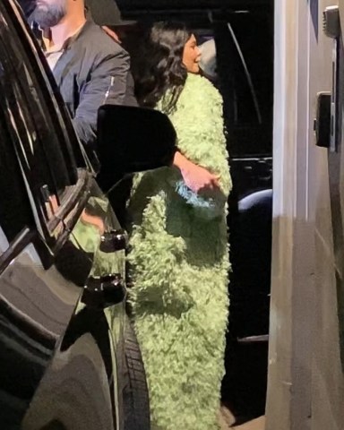 Los Angeles, CA  - *EXCLUSIVE*  - Kylie Jenner looks stunning in a green long coat as she arrives at a Sunny Vodka event after recently opening up about her postpartum recovery on social media. The mom of two was seen briefly in a long green fuzzy coat.  Pictured: Kylie Jenner  BACKGRID USA 16 MARCH 2022   USA: +1 310 798 9111 / usasales@backgrid.com  UK: +44 208 344 2007 / uksales@backgrid.com  *UK Clients - Pictures Containing Children Please Pixelate Face Prior To Publication*