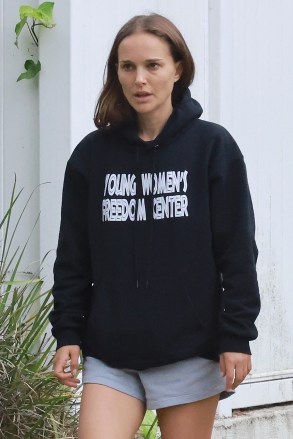 Los Feliz, California - * EXCLUSIVE * - Natalie Portman with wide eyes enjoys a walk with a friend in the Los Feliz area.  She kept her appearance comfortable, wearing a navy blue hood and shorts from the Young Women's Freedom Center.  Pictured: Natalie Portman BACKGRID USA 21 MAY 2022 USA: +1 310 798 9111 / usasales@backgrid.com UK: +44 208 344 2007 / uksales@backgrid.com * UK clients - Photos containing children, Please , Pixe to post photos