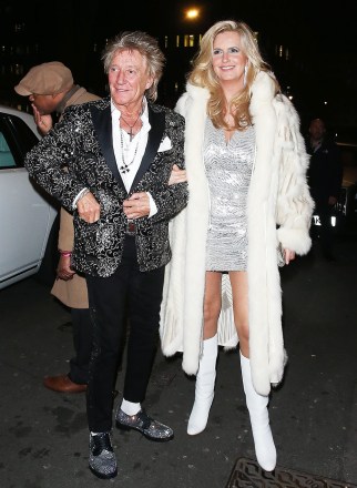London, UNITED KINGDOM - Rod Stewart & Penny Lancaster leaving Annabel's in Mayfair, London after celebrating the members club 4th Birthday.  Penny was seen having a wardrobe malfunction as she left the venue.  Rod was seen arguing with a fan who asked for an autograph on a Celtic shirt with the singer's name on the back but Rod refused to sign the shirt and became annoyed and immediately got in his car and left.  Pictured: Rod Stewart, Penny Lancaster BACKGRID USA 10 MARCH 2022 BYLINE MUST READ: Click News and Media / BACKGRID USA: +1 310 798 9111 / usasales@backgrid.com UK: +44 208 344 2007 / uksales@backgrid.com *UK Clients - Pictures Containing Children Please Pixelate Face Prior To Publication*