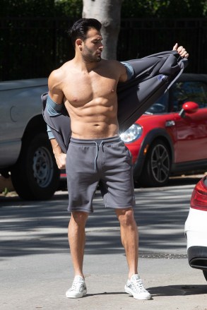 EXCLUSIVE: Britney Spears BF Sam Asghari Shows Off His Crazy Physique Wearing An Extremely Tight Sweater Prior to Working Out. 24 Mar 2021 Pictured: Sam Asghari. Photo credit: 007 / MEGA TheMegaAgency.com +1 888 505 6342 (Mega Agency TagID: MEGA741975_023.jpg) [Photo via Mega Agency]