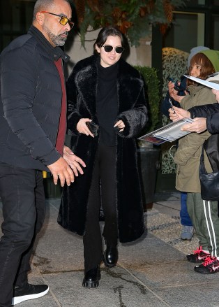 New York, NY - Selena Gomez wore a fur coat and carried a Luis Vuitton bag as she left a NYC hotel this afternoon.  Photo: Selena Gomez BACKGRID United States December 13, 2022 United States: +1 310 798 9111 / usasales@backgrid.com United Kingdom: +44 208 344 2007 / uksales@backgrid.com *UK customers - Photo photos with children Please pixelate faces before publishing*