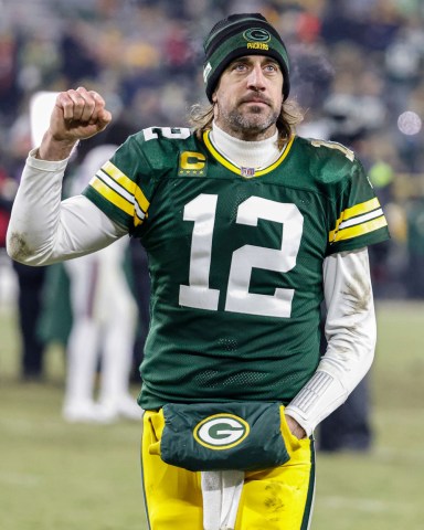 Green Bay Packers quarterback Aaron Rodgers (12) reacts as he leaves the field after an NFL game against the Minnesota Vikings Sunday, Jan 2. 2022, in Green Bay, Wis
Vikings Packers Football, Green Bay, United States - 03 Jan 2022
