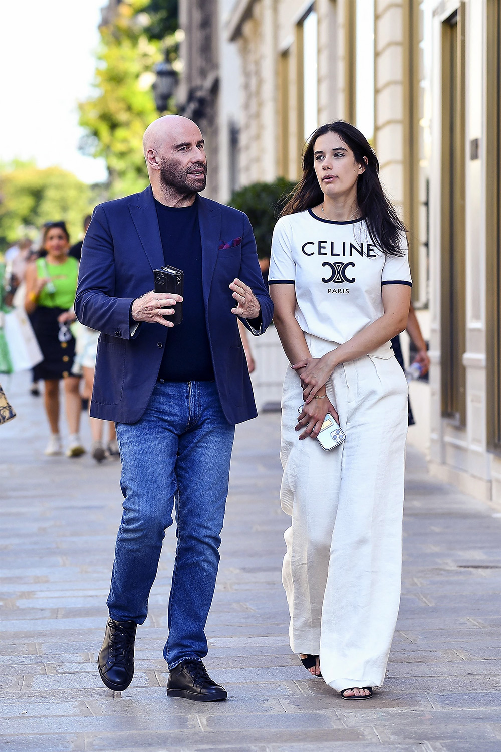 *EXCLUSIVE* John Travolta and daughter Ella Bleue Travolta enjoy some retail therapy at Chanel and Dior during vacay in Paris!