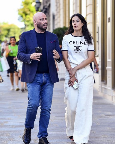 Paris, FRANCE - *EXCLUSIVE* - Actor John Travolta and his daughter Ella Bleue Travolta go shopping on avenue Montaigne at Chanel and Dior before returning to their hotel in Paris, France.Pictured: John Travolta, Ella Bleue TravoltaBACKGRID USA 18 JULY 2022 BYLINE MUST READ: Best Image / BACKGRIDUSA: +1 310 798 9111 / usasales@backgrid.comUK: +44 208 344 2007 / uksales@backgrid.com*UK Clients - Pictures Containing ChildrenPlease Pixelate Face Prior To Publication*