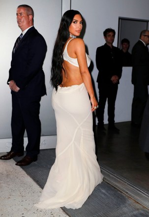 Kim Kardashian wears a stunning backless white dress and Priyanka Chopra dazzles in a silver dress when attending a Tiffany's event in New York. 10 Oct 2018 Pictured: Kim Kardashian. Photo credit: FZS / MEGA TheMegaAgency.com +1 888 505 6342 (Mega Agency TagID: MEGA289844_017.jpg) [Photo via Mega Agency]