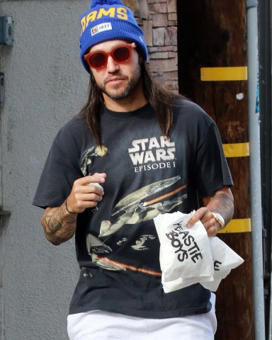 Los Angeles, CA  - Pete Wentz grabs food to go at Yeastie Boys food truck on Tuesday and the singer shows off his love for Star Wars with a vintage tee.  Pictured: Pete Wentz  BACKGRID USA 17 DECEMBER 2019   BYLINE MUST READ: Phamous / BACKGRID  USA: +1 310 798 9111 / usasales@backgrid.com  UK: +44 208 344 2007 / uksales@backgrid.com  *UK Clients - Pictures Containing Children Please Pixelate Face Prior To Publication*
