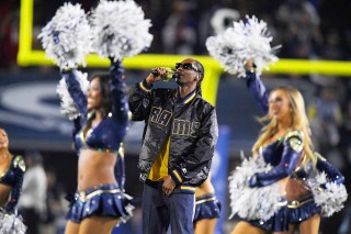 Snoop Dogg performs with the Los Angeles Rams cheerleaders during halftime of an NFL football wild-card playoff game against the Atlanta Falcons, in Los Angeles
Falcons Rams Football, Los Angeles, USA - 06 Jan 2018