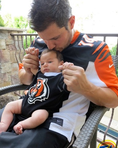 Nick Lachey and his infant son wear matching black and orange Cincinnati Bengals jerseys in a new ad campaign for Tide. One-month-old Camden John sits on his famous father's lap in the image, released as part of the the laundry detergent brand's  Show Us Your Colors promotion. Tide is urging NFL fans to go to their Facebook page - http://www.facebook.com/tide - or Tide.com to upload a photo of the time they were most proud to wear their team's colors, in a bid to win an all expenses paid trip for two to Super Bowl XLVII in New Orleans, LA. Camden was born on September 12 to Nick, 38, and wife Vanessa. *MANDATORY BYLINE - SPLASH NEWS/TIDE.COM*

Pictured: Nick Lachey
son Camden
Ref: SPL446604 121012 NON-EXCLUSIVE
Picture by: SplashNews.com

Splash News and Pictures
USA: +1 310-525-5808
London: +44 (0)20 8126 1009
Berlin: +49 175 3764 166
photodesk@splashnews.com

World Rights