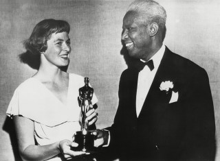 Swedish actress, Ingrid Bergman presents a special Academy Award to actor James Baskett. In March 1948 he was recognized for his role as Uncle Remus in the Disney film, SONG OF THE SOUTH.
Historical Collection
