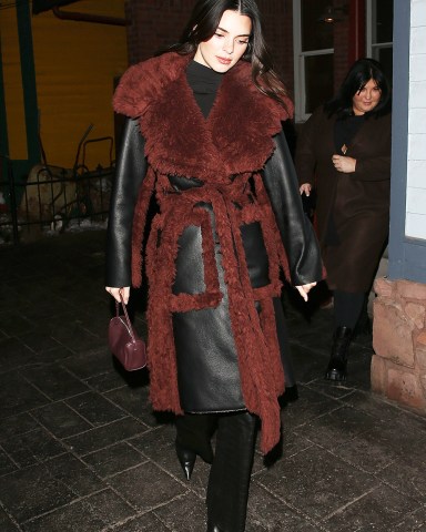 Aspen, CO  - *EXCLUSIVE*  -Kylie and Kendall Jenner enjoy a night out at 'Matsuhisa' Sushi Restaurant in Aspen Colorado.The sisters put on a very stylish display as they stepped out together for dinner on Sunday for a girl’s night out. Kylie stepped out in jeans, a white collared top with buttons and a fur bucket hat. Kendall put on a chic display in all black and a leather coat with fur lining.Pictured: Kendall JennerBACKGRID USA 12 DECEMBER 2022 BYLINE MUST READ: 1 / BACKGRIDUSA: +1 310 798 9111 / usasales@backgrid.comUK: +44 208 344 2007 / uksales@backgrid.com*UK Clients - Pictures Containing ChildrenPlease Pixelate Face Prior To Publication*