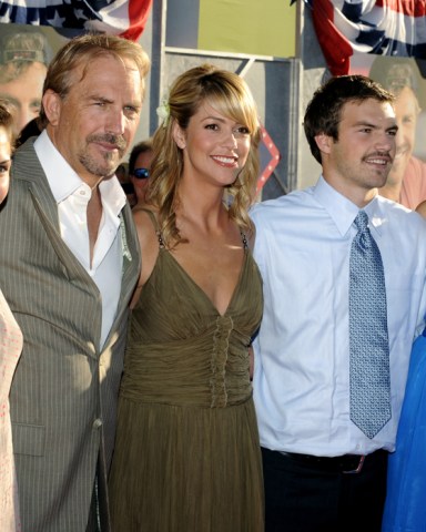 Kevin Costner (2nd-L), who stars in the motion picture comedy "Swing Vote", attends the premiere of the film with his wife Christine (C) and his children Lily, Joe and Annie at El Capitan Theatre in the Hollywood section of Los Angeles on July 24, 2008.
Movie Premeire, Los Angeles, California - 25 Jul 2008