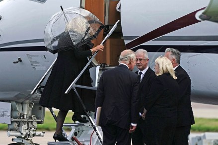 Camilla, the Queen Consort, left, boards a plane following Britain's King Charles III, second from left, as they leave Aberdeen Airport to travel to London following Thursday's death of Queen Elizabeth II, in Aberdeen, Scotland.  King Charles III, who spent much of his 73 years preparing for the role, planned to meet with the prime minister and address a nation grieving the only British monarch most of the world had known.  He takes the throne in an era of uncertainty for both his country and the monarchy itself Queen, Aberdeen, United Kingdom - 09 Sep 2022