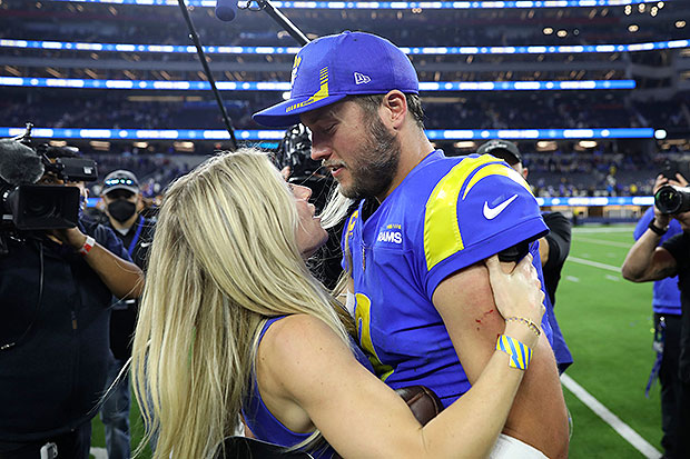 Los Angeles Rams quarterback Matthew Stafford kisses his wife Kelly Hall  after the NFL Super Bo …