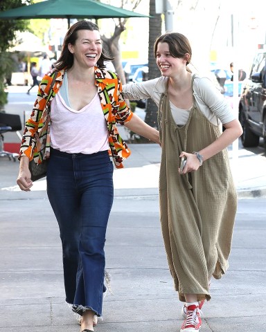 Beverly Hills, CA  - *EXCLUSIVE*  - Milla Jovovich spends some quality time with her 14-year-old daughter Ever in Beverly Hills. Ever gets silly for the cameras as the mother-daughter-duo go about their day together.

Pictured: Milla Jovovich

BACKGRID USA 26 APRIL 2022 

BYLINE MUST READ: BACKGRID

USA: +1 310 798 9111 / usasales@backgrid.com

UK: +44 208 344 2007 / uksales@backgrid.com

*UK Clients - Pictures Containing Children
Please Pixelate Face Prior To Publication*