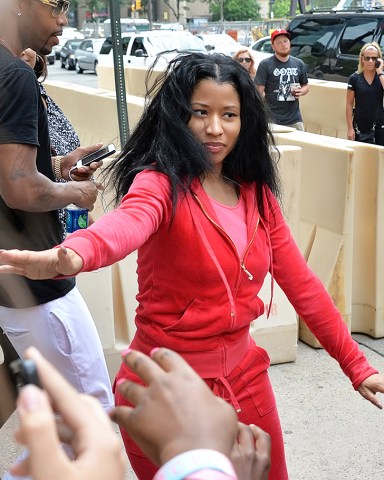 Nicki Minaj, dressed down in an all red Juicy tracksuit, leaves her hotel to rehearse for the 'Philly 4th of July Jam and Grand Fireworks Finale'Featuring: Nicki MinajWhere: Philadelphia, Pennsylvania, United StatesWhen: 03 Jul 2014Credit: Hugh Dillon/WENN.com Newscom/(Mega Agency TagID: wennphotosfour509929.jpg) [Photo via Mega Agency]