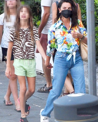 Portofino, ITALY  - *EXCLUSIVE*  - Spanish Actress Penelope Cruz dons her summery floral patterned blouse top and jeans out with her children on holiday at the Hotel Astoria in Rapallo.Penelope on her European break is still being extra careful about the ongoing threat of COVID-19 by wearing her face mask with her two children Luna and Leo.The Vicky Cristina Barcelona actress and Javier Bardem's wife had previously expressed that she would love to make a musical film with her husband after seeing him belt out some tunes in Being the Ricardos according to reports. **SHOT ON 07/29/22**Pictured: Penelope CruzBACKGRID USA 15 AUGUST 2022 USA: +1 310 798 9111 / usasales@backgrid.comUK: +44 208 344 2007 / uksales@backgrid.com*UK Clients - Pictures Containing ChildrenPlease Pixelate Face Prior To Publication*