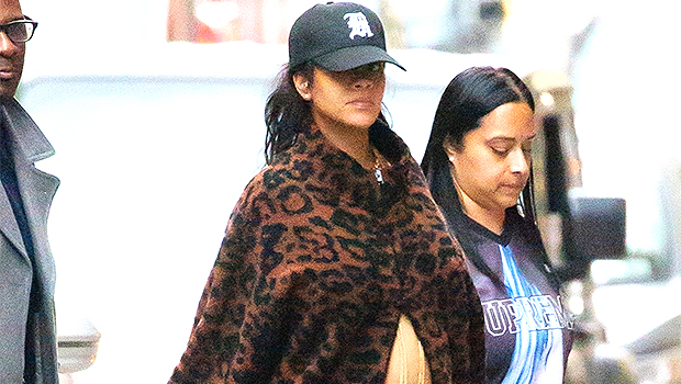 Rihanna s Baby Bump With Gold Body Jewelry Cheetah Fleece