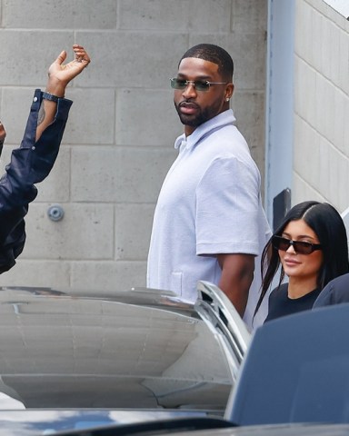 *EXCLUSIVE* Calabasas, CA  - Travis Scott and Kylie Jenner rare outings during a kid's dance performance in Calabasas. Travis Scott was also accompanied by his mother, Wanda Webster.  Pictured: Tristan Thompson and Kylie Jenner  BACKGRID USA 19 JUNE 2022   USA: +1 310 798 9111 / usasales@backgrid.com  UK: +44 208 344 2007 / uksales@backgrid.com  *UK Clients - Pictures Containing Children Please Pixelate Face Prior To Publication*