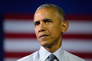 CHARLOTTE, NC, USA - JULY 5, 2016: President Barack Obama with a solemn face while delivering a speech at the Charlotte Convention Center.; Shutterstock ID 449433211; purchase_order: Photo; job: Farrah