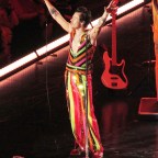Harry Styles shows off his colorful style as she takes the stage for the 15th and final time at his record breaking residency in NYC