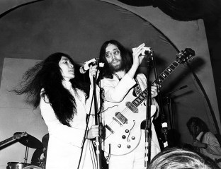 John Lennon with Yoko Ono performing at a benefit for UNICEF ca. 1969 in London