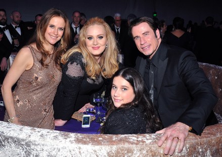 Kelly Preston, from left, singer Adele, Ella Bleu Travolta, and John Travolta attend the Governor's Ball following the Oscars at the Dolby Theatre, in Los Angeles 85th Academy Awards - Governors Ball, Los Angeles, USA