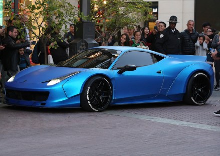 Justin Bieber drinks a coffee whilst leaving The Grove in his Ferrari in West Hollywood, CaliforniaPictured: Justin Bieber Ferrari,Justin Bieber FerrariJustin BieberRick CarusoRef: SPL1193434 111215 NON-EXCLUSIVEPicture by: SplashNews.comSplash News and PicturesUSA: +1 310-525-5808London: +44 (0)20 8126 1009Berlin: +49 175 3764 166photodesk@splashnews.comWorld Rights, No France Rights