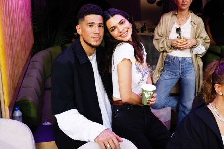 NBA player Devin Booker of the Phoenix Suns (L) poses with Kendall Jenner during half time of Super Bowl LVI between the Los Angeles Rams and the Cincinnati Bengals at SoFi Stadium in Los Angeles on Sunday, February 13, 2022.
Super Bowl Lvi, Los Angeles